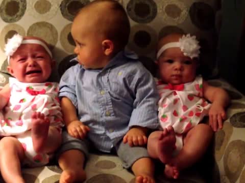 Adorably Confused Baby Meets Twins 6