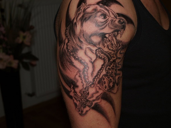pitbull-tattoo-on-upper-arm photo